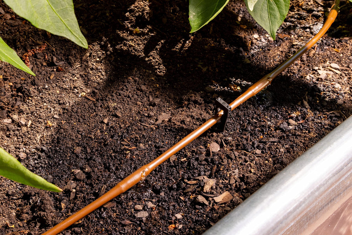 Rain Bird GardenKit fittings and end caps secure connections for quick setup.