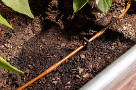 Rain Bird GardenKit fittings and end caps secure connections for quick setup.