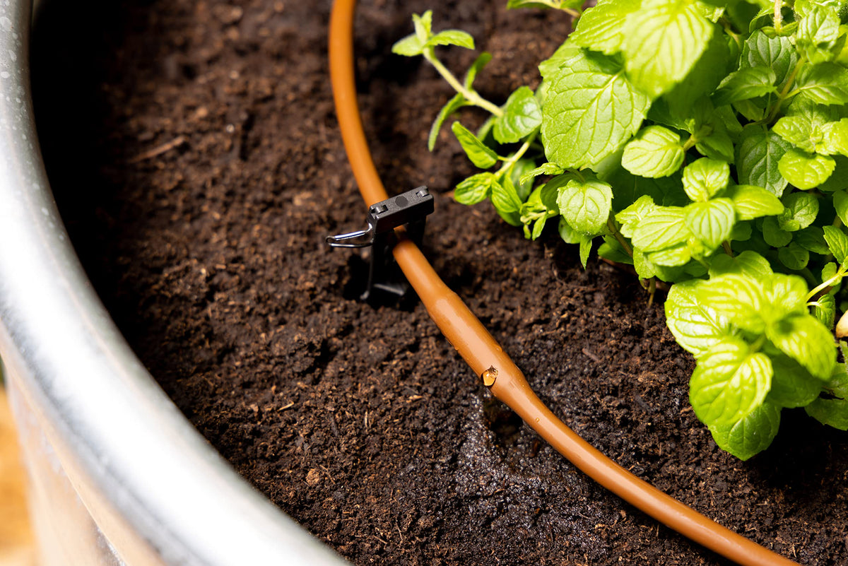 Rain Bird GardenKit instruction manual guides simple layouts for DIY irrigation.