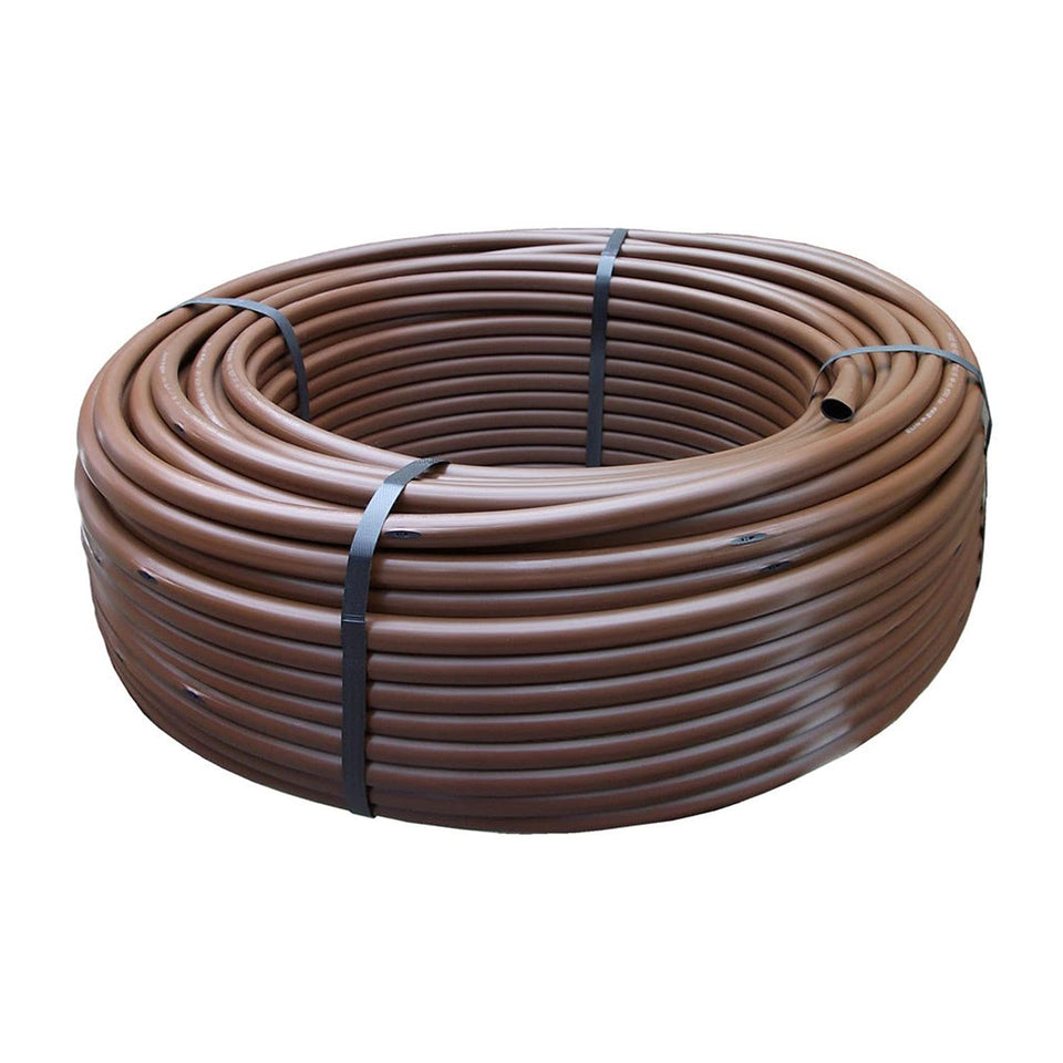 Rain Bird XFD on-surface dripline emitter closeup for efficient irrigation at 0.9 gph