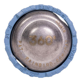 Rainbird R-VAN14-360 nozzle adjustment shows tool-free radius control during irrigation.