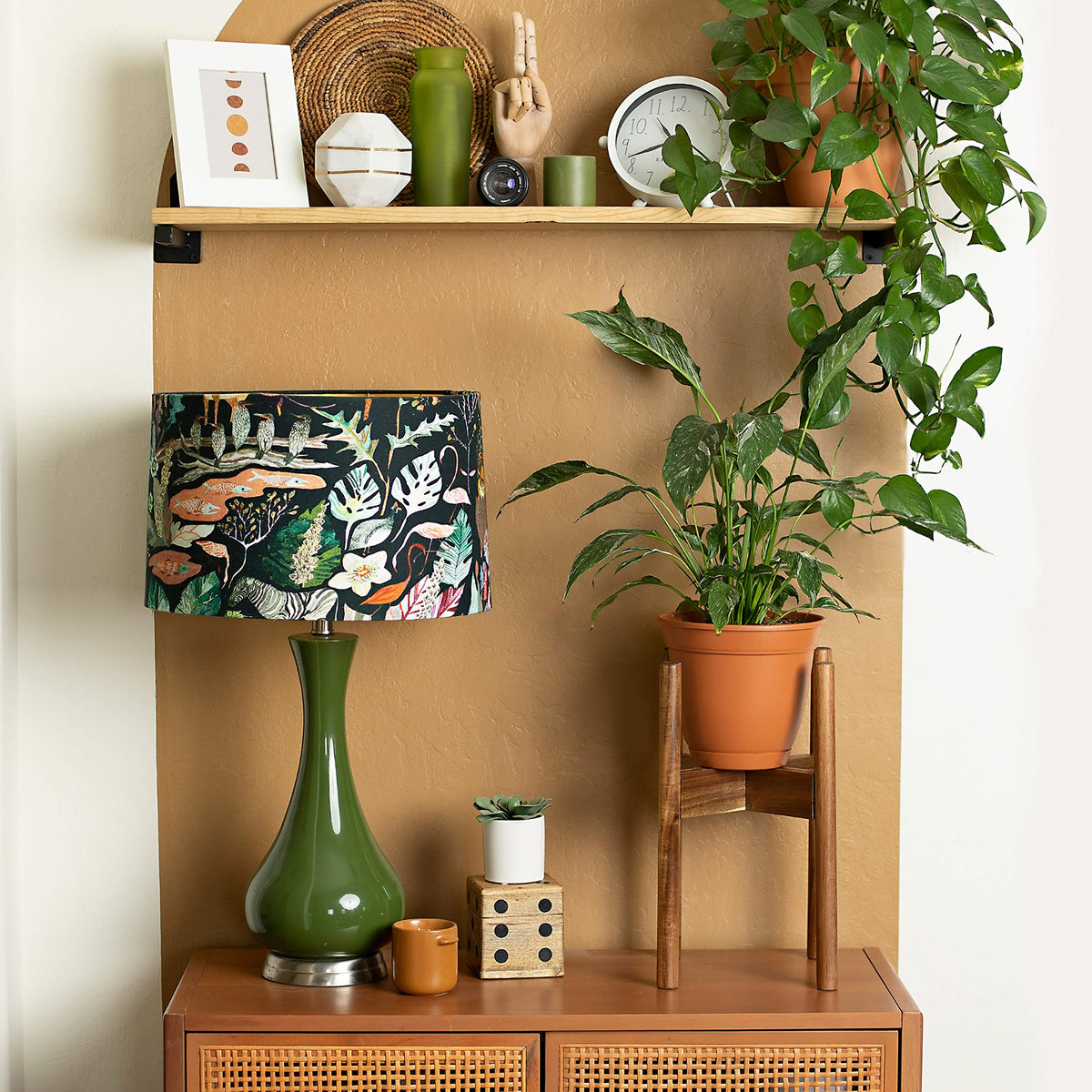 RAINBLELAND plant stand in living room elevates decor and allows easy rearrangement.