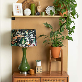 RAINBLELAND plant stand in living room elevates decor and allows easy rearrangement.