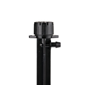 Raindrip 5-inch stake shown during installation for root-zone watering.