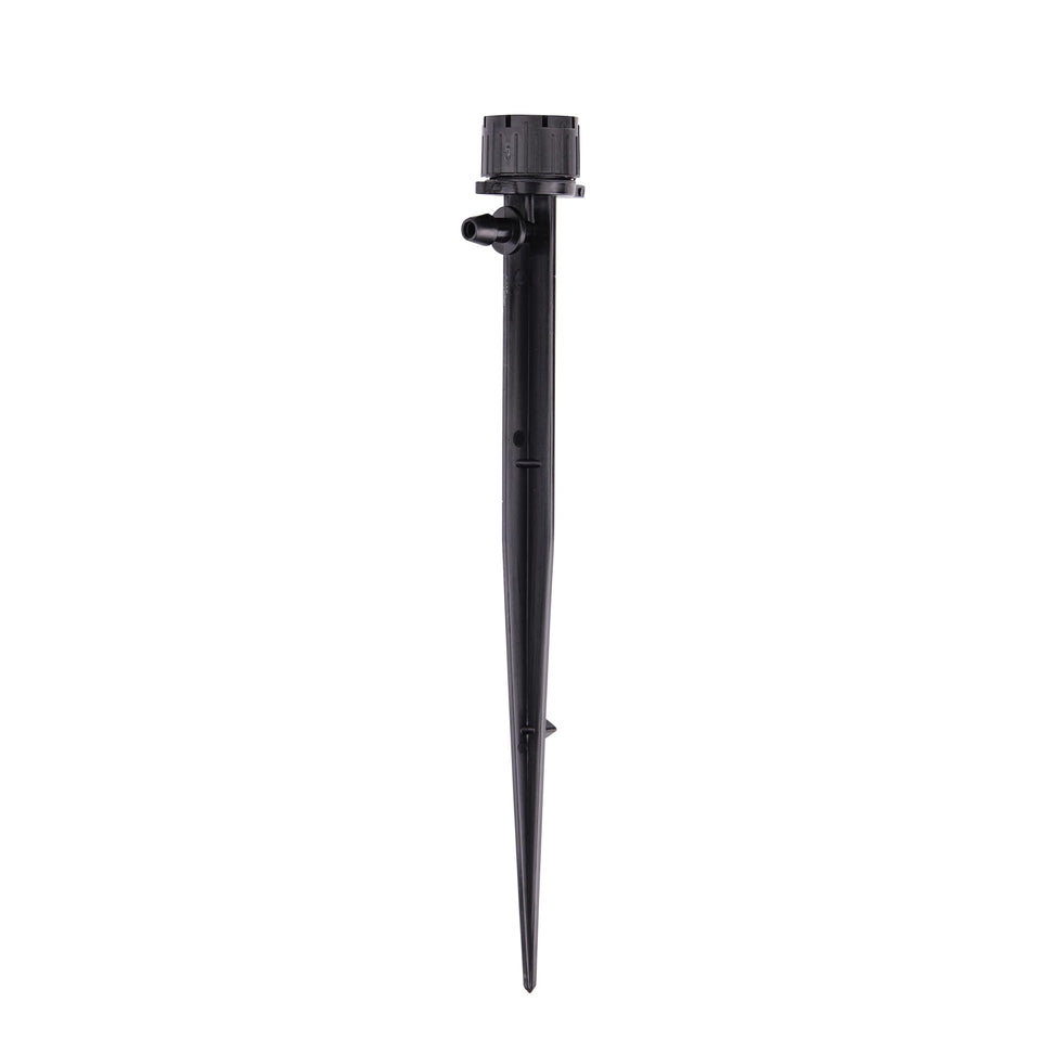Raindrip adjustable flow bubbler on stake delivering customizable garden watering.