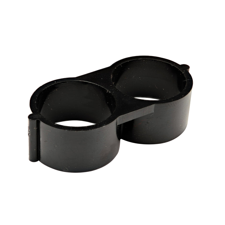 Raindrip end clamp with figure-8 design seals dripline up to 50 psi.