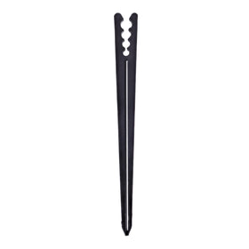 Raindrip emitter positioning stake keeps emitters near roots for easy adjustment.