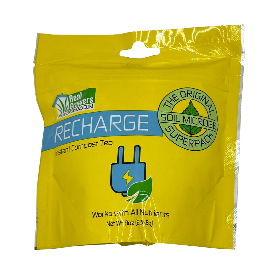 Real Growers Recharge bottle with label highlighting living soil solution.