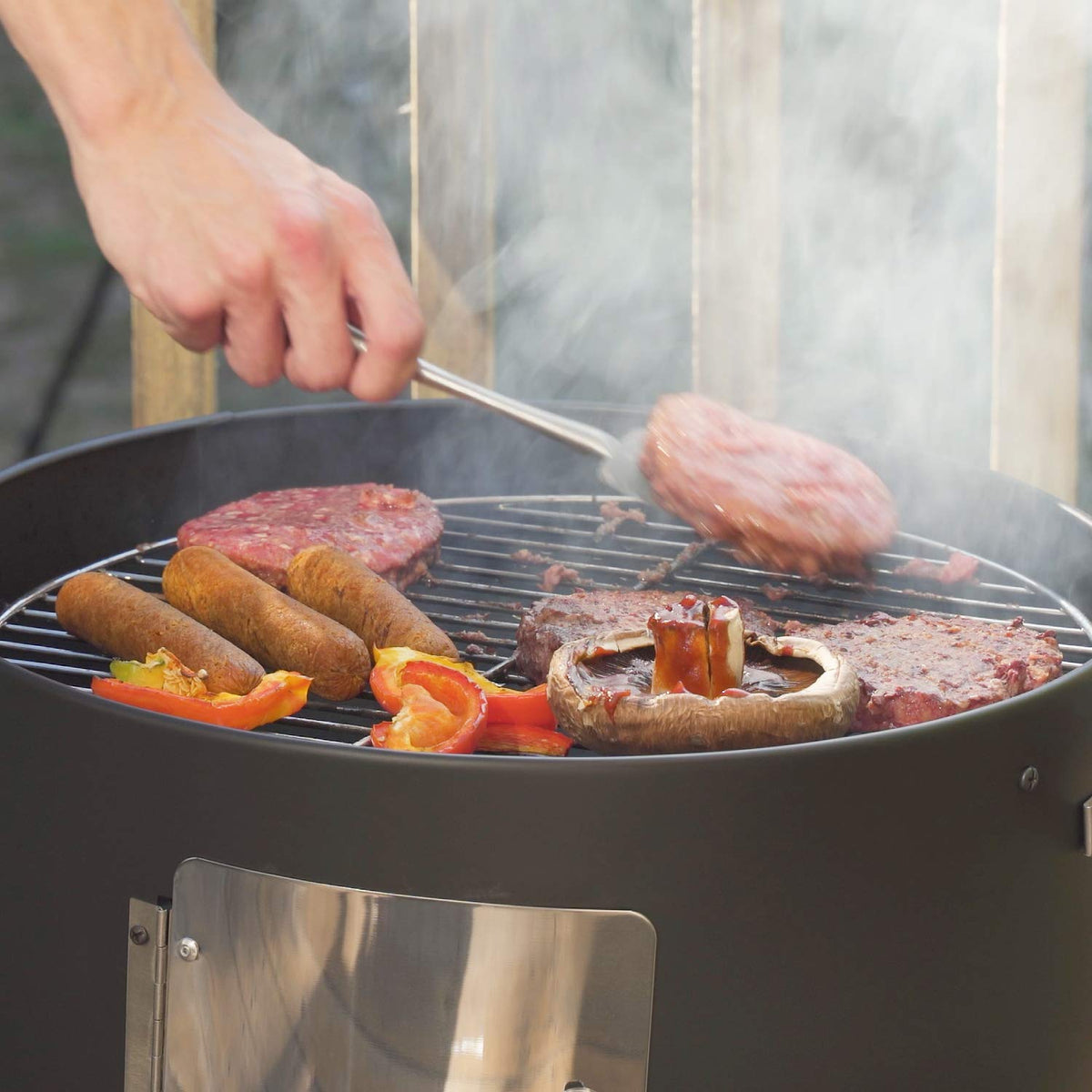 Realcook water pan inside maintains moisture for even cooking.