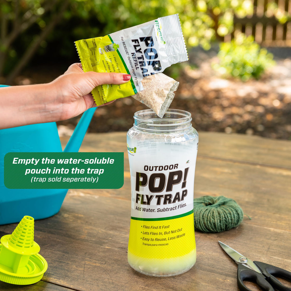 RESCUE! POP! Fly Trap Bait Refills attracting common nuisance flies outdoors