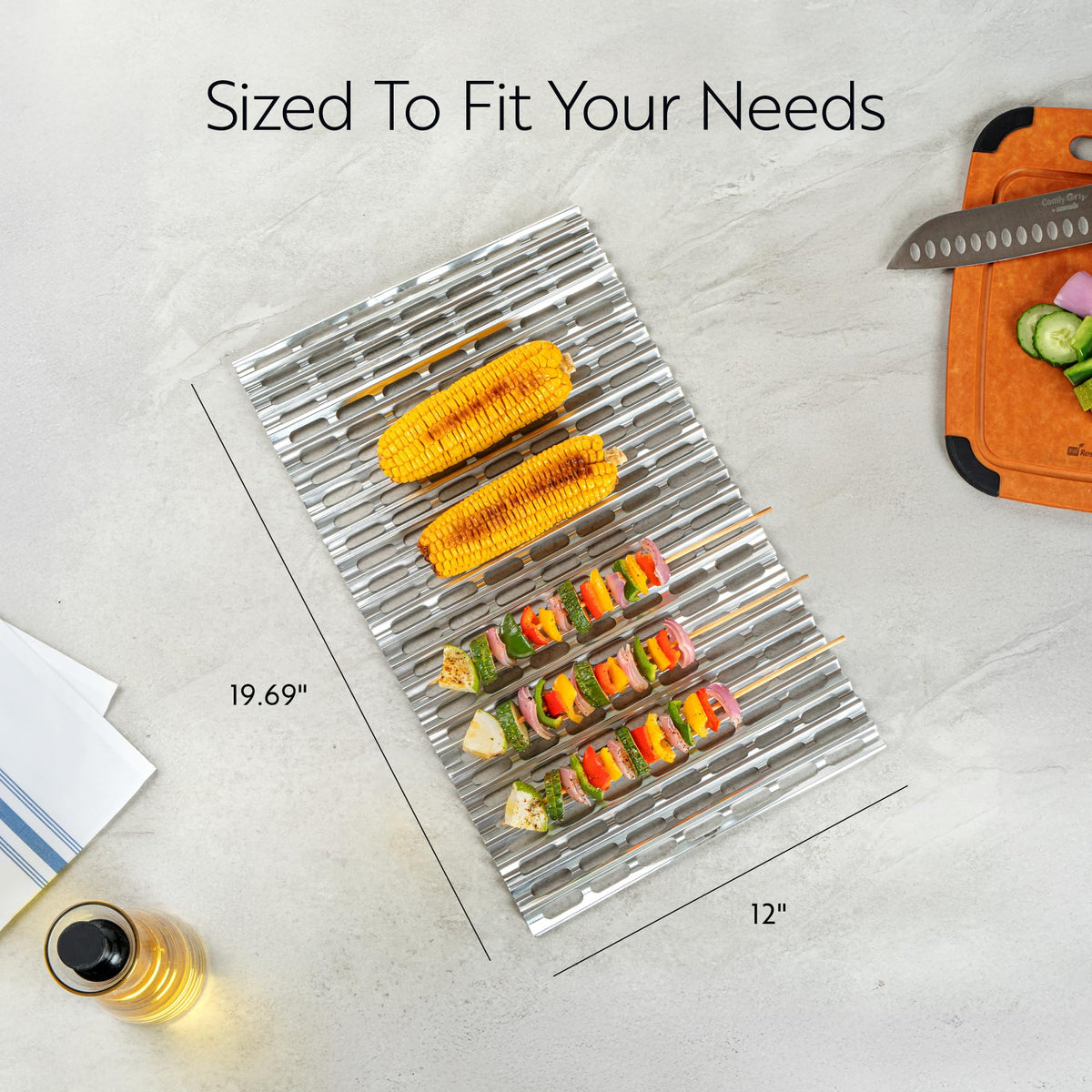 Restaurantware Foil Lux liner stretched to fit standard grills for quick setup.