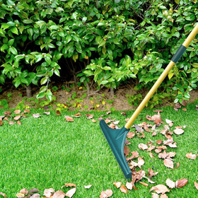 Restick turf rake's stainless steel handle offers durability and a firm grip.