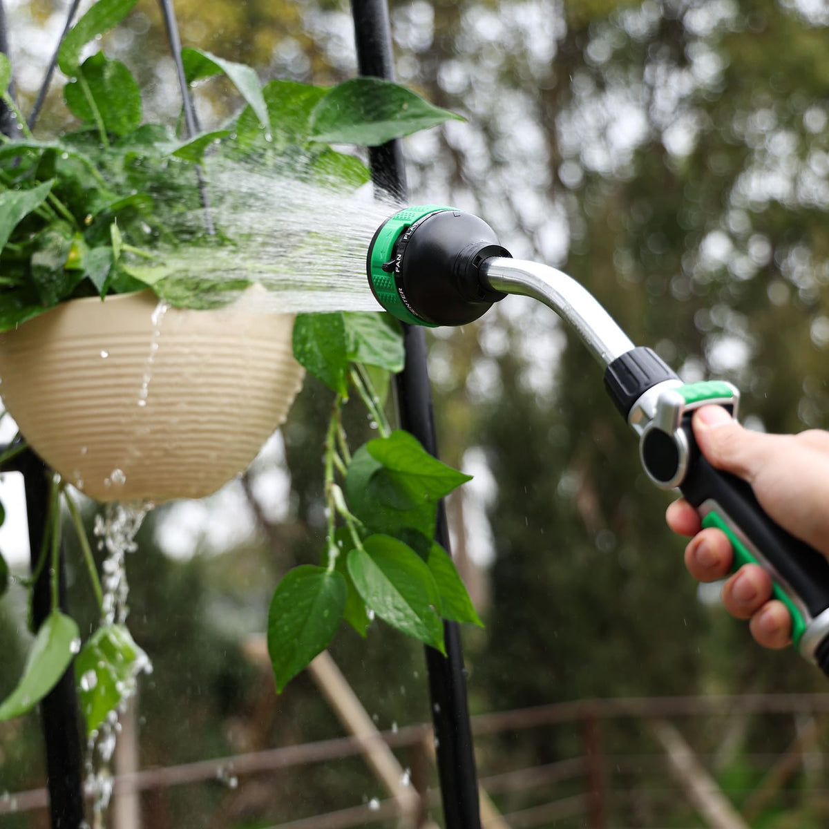 Restmo 2in1 watering wand in full pattern for quick bucket filling and irrigation