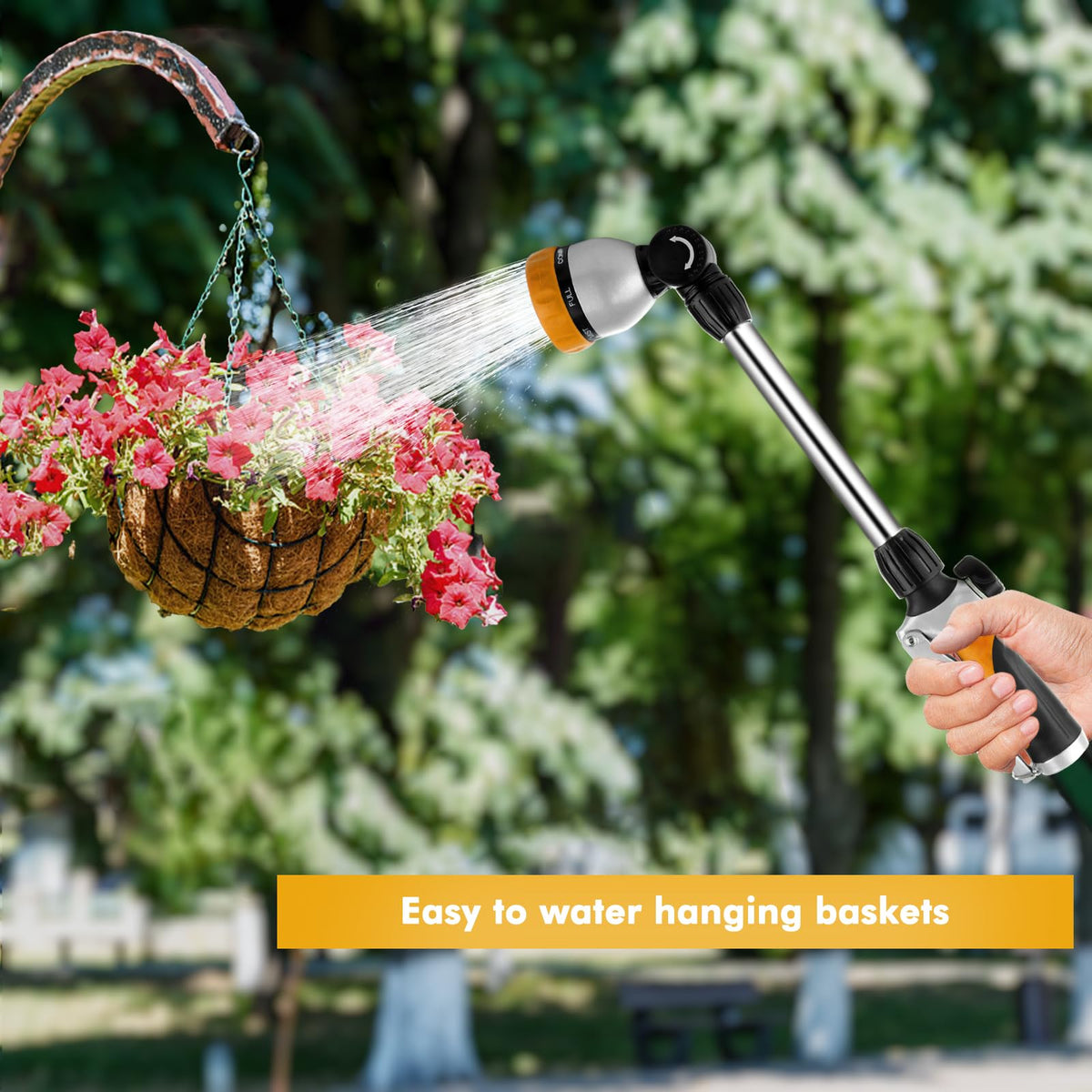 Restmo metal watering wand in-use over hanging baskets provides gentle irrigation for blooms.