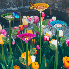 Retyion bee watering station with blue flower design provides a gentle drinking spot.