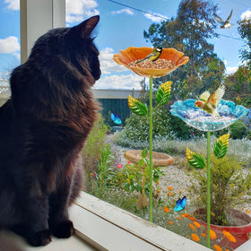 Retyion flower-bird-bath adds color and charm to porches and patios.
