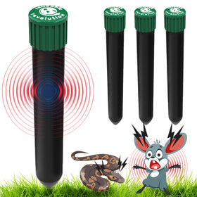Reusable Revolution Mole Chaser stakes lined up along a yard to deter pests.