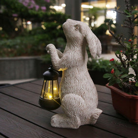 REYISO garden statue rabbit solar lantern brightens outdoor spaces at night
