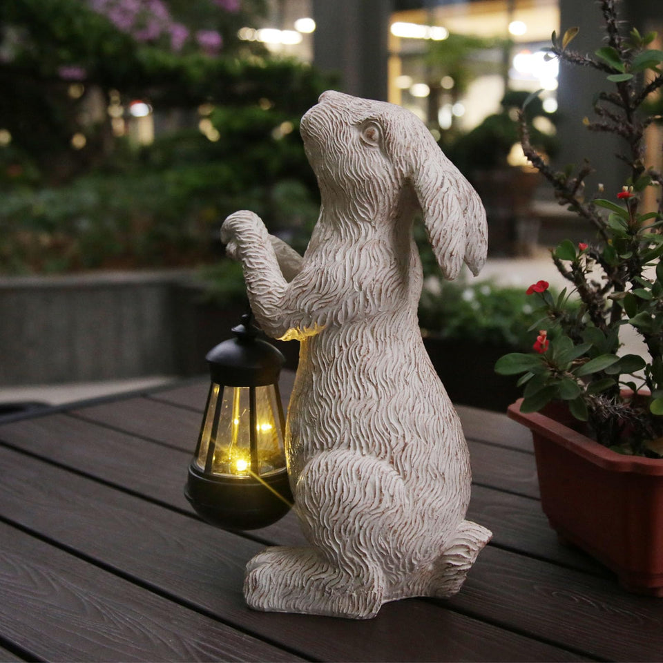 REYISO garden statue rabbit solar lantern brightens outdoor spaces at night