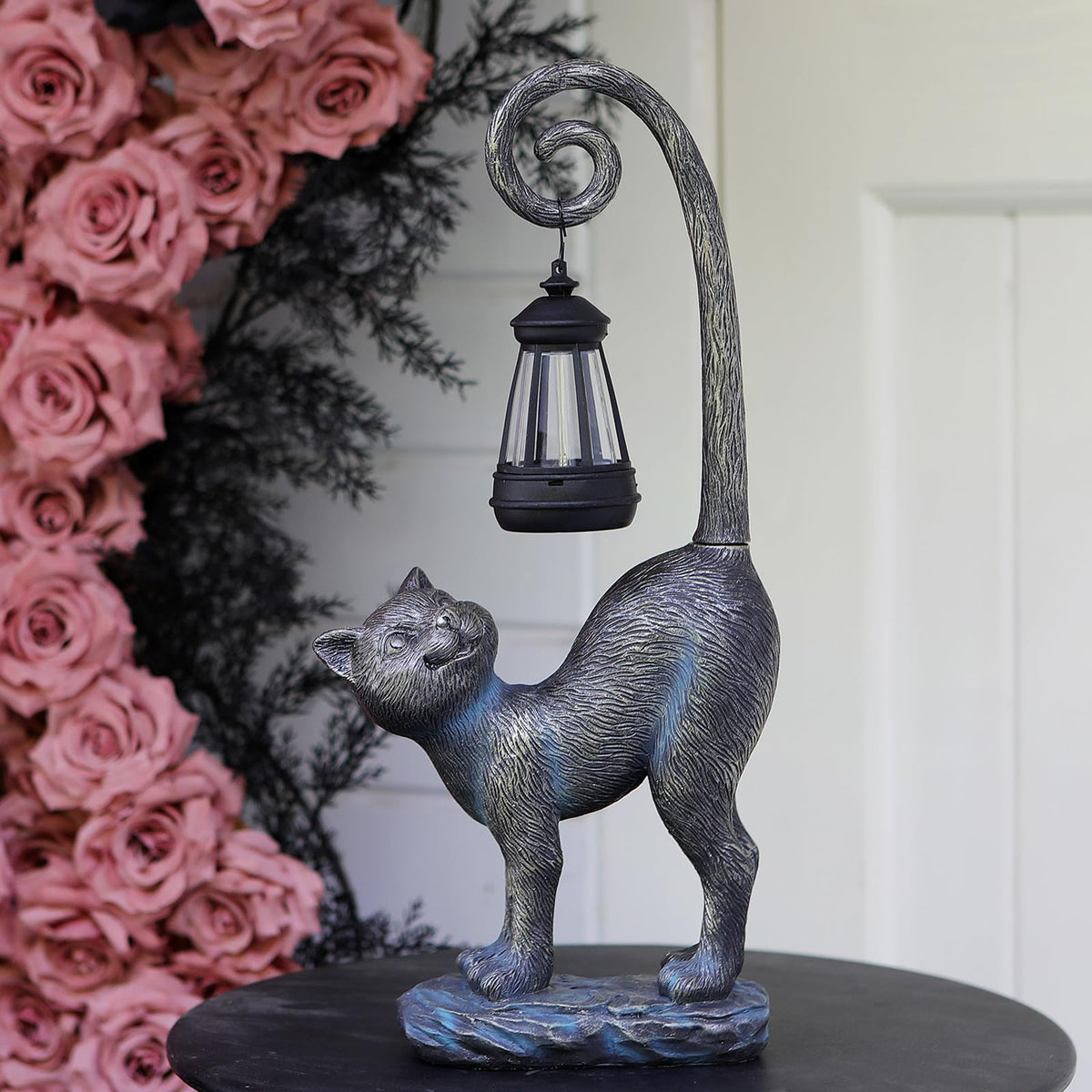 REYISO detachable-tail cat statue for flexible placement in your yard.
