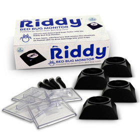 Riddy bed bug detection kit trap placed under a bed leg for early alerts