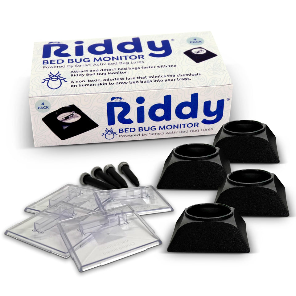 Riddy bed bug detection kit trap placed under a bed leg for early alerts
