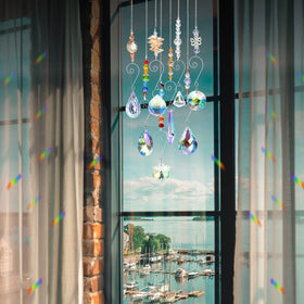 RIFNY crystal ornament chain reflects sun and lamplight for shimmering walls