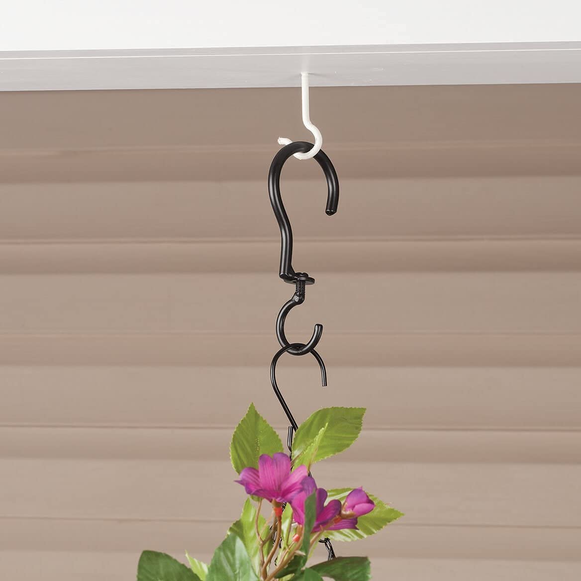 Ritadeshop swivel hooks decorating indoor spaces with lanterns, wind chimes, and ornaments.