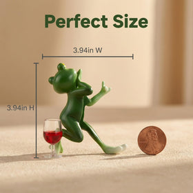 RJVZUKL Tipsy Frog Pot Hugger placed beside a plant for indoor or patio display