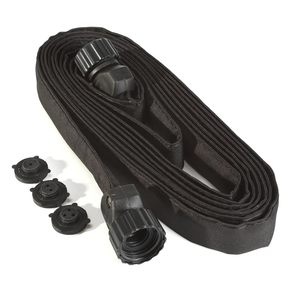 Rocky Mountain Goods flat soaker hose 15ft laid along garden bed for even watering.