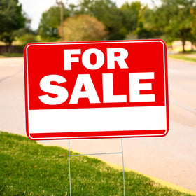 Rogue River Tactical yard sign installed in a residential front yard.
