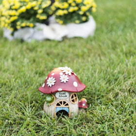 Roman Inc mushroom and flowers statue adds whimsy to garden pathways