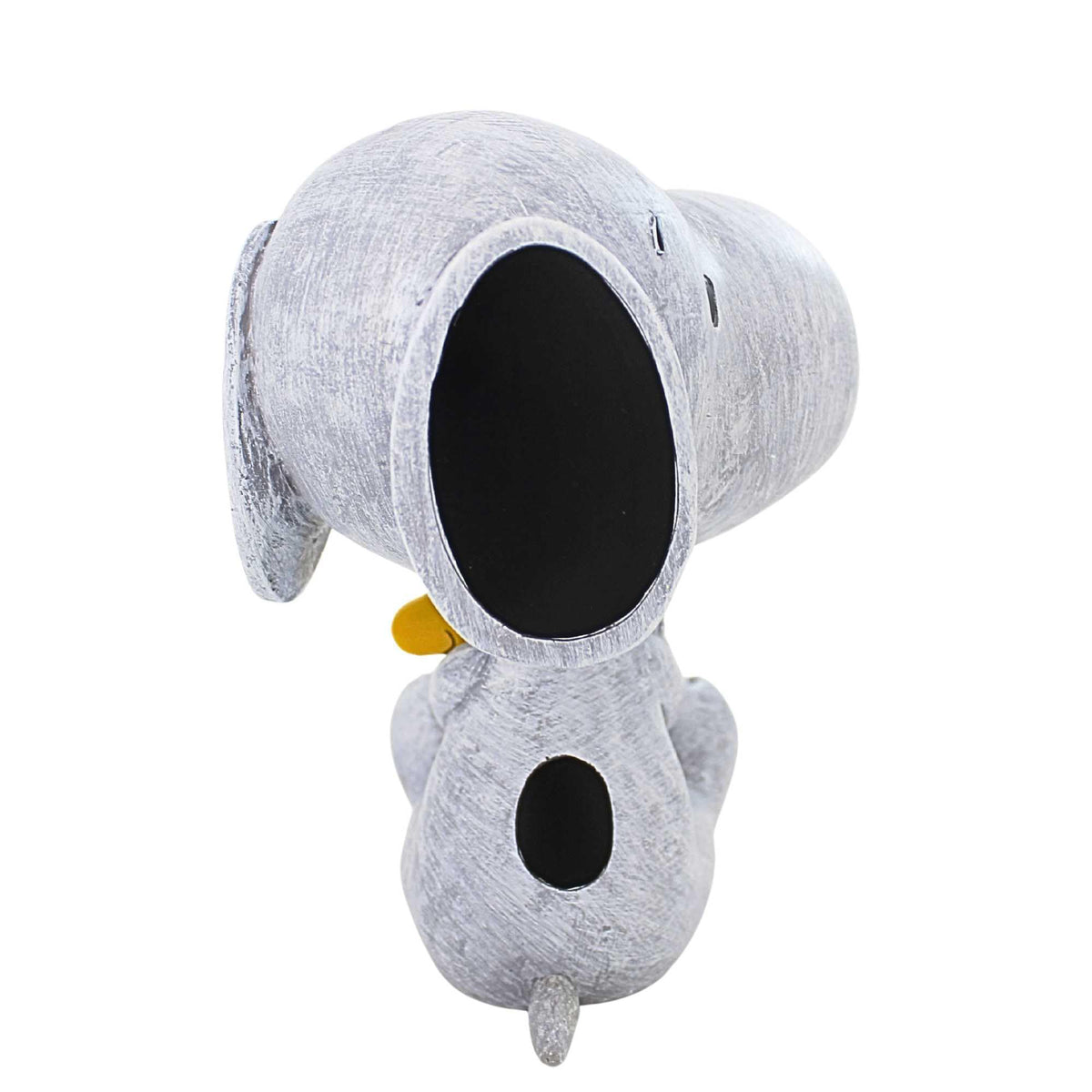 Roman Snoopy and Woodstock statue placed in garden setting adds whimsy