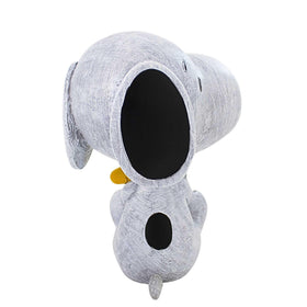 Roman Snoopy and Woodstock statue placed in garden setting adds whimsy