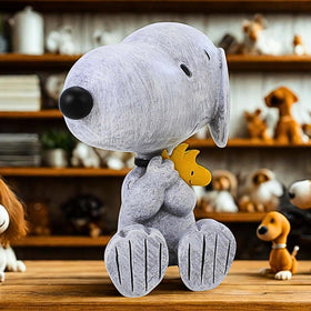 Roman Snoopy and Woodstock texture detail highlights resin and stone finish