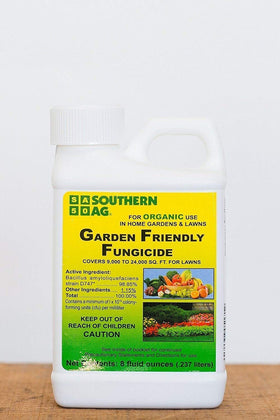 Root 98 Garden-Friendly Biofungicide being applied in spray action for disease prevention