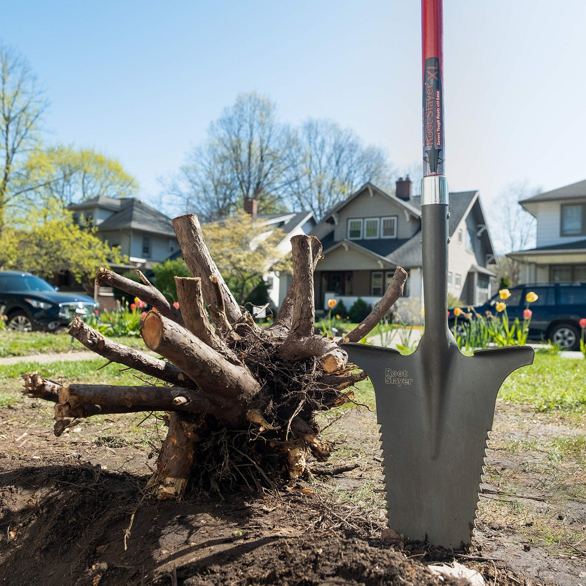 Root Slayer large digging blade penetrates soil efficiently for landscaping projects.