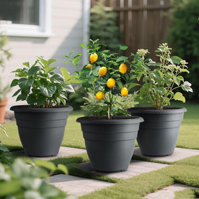 RooTrimmer 12-inch gray pot with hanging holes for vertical gardening.