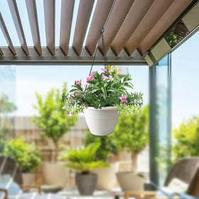 RooTrimmer planter bottom drainage holes help prevent overwatering.