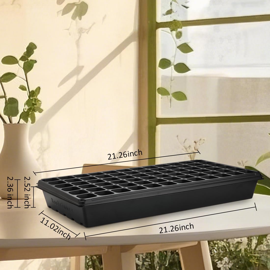 RooTrimmer trays in a bright indoor garden for seed germination and growth.
