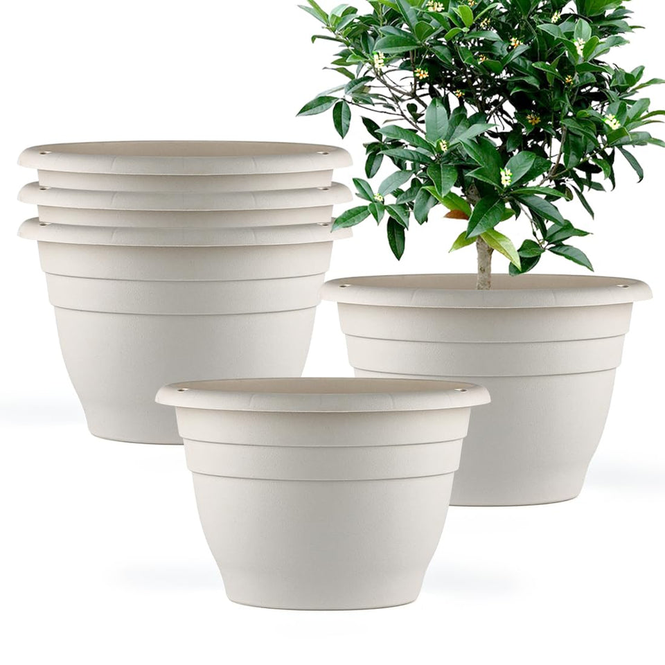 RooTrimmer 10-inch round white plant pot with drainage holes for indoor or outdoor use.