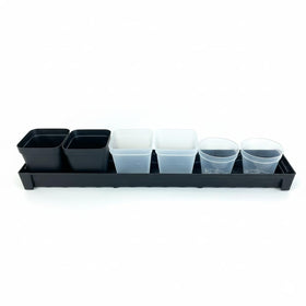 RooTrimmer seed starting on a windowsill with these trays