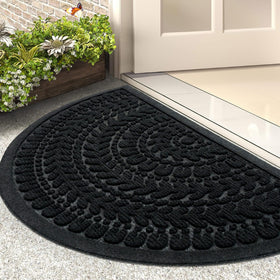 RORA half-circle door mat in black at entry, traps dirt and moisture.
