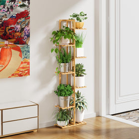 ROSSNY bamboo plant rack combines mid-century style with sturdy support.