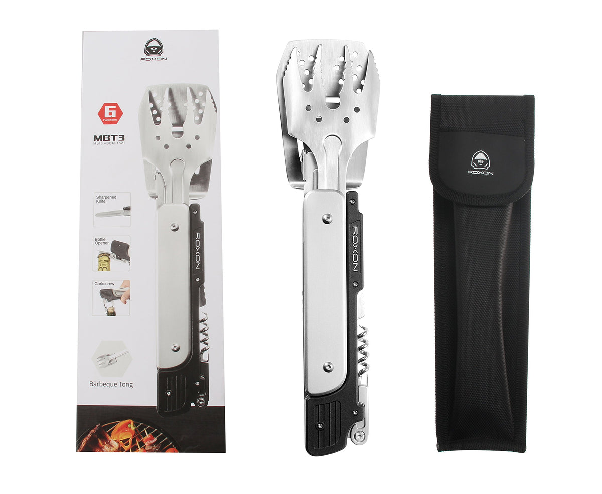 Roxon S601 grilling fork in action at barbecue.