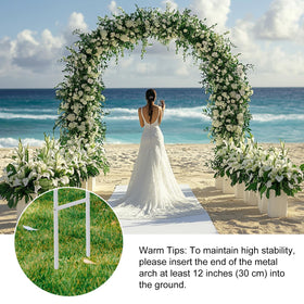 rubfac garden arch decorated with flowers, lights, and greenery