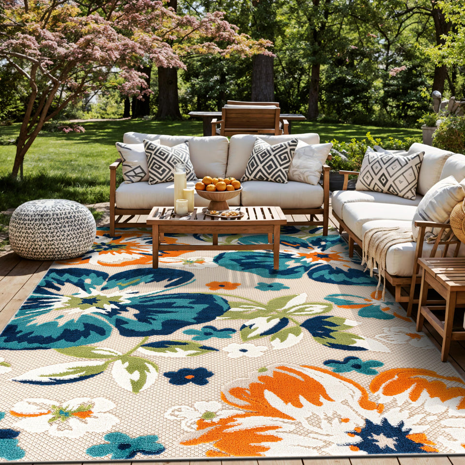 Rugshop Multi Bergamo floral rug outdoors patio view highlights fade-resistant color.