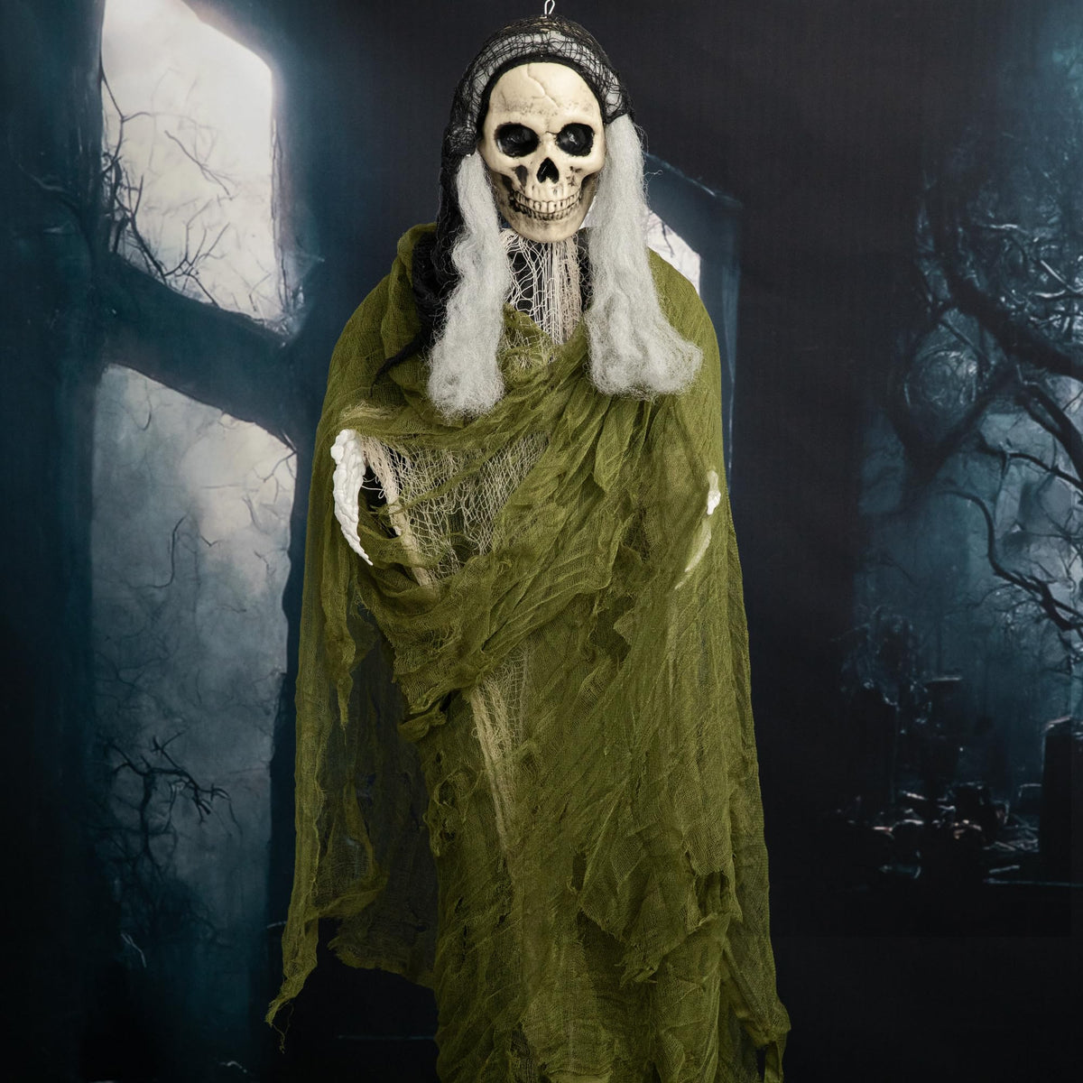 RunNico haunted cheesecloth garland adds layered depth to Halloween props.