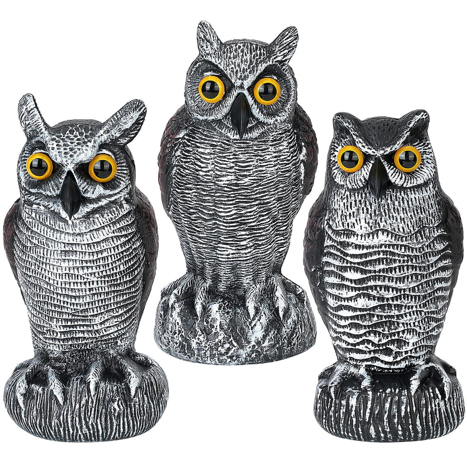 Ruolan owl decoy on a stable base deters birds in outdoor spaces.