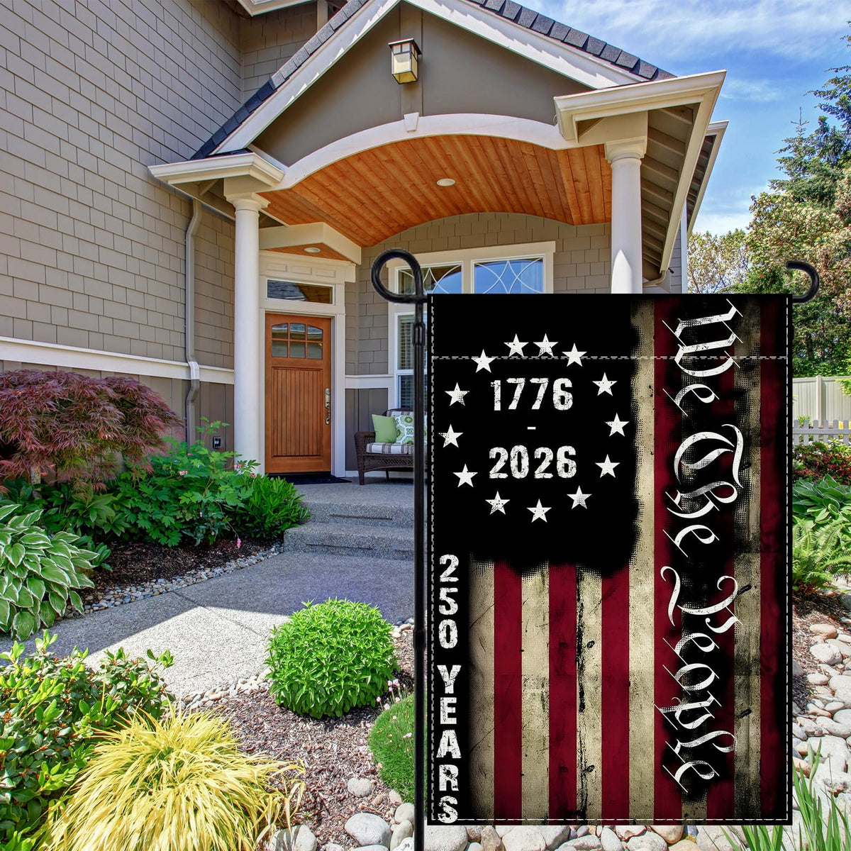 Rvsticty garden flag displayed in a neat yard setup